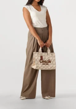 beige coach handtas maxi signature canvas cargo tote
