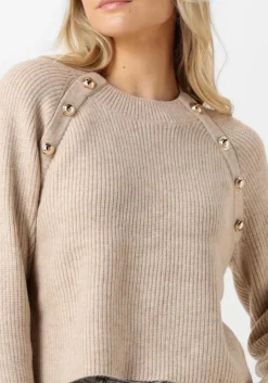 beige co'couture trui the row officer rib knit