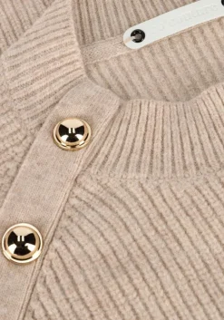 beige co'couture trui the row officer rib knit