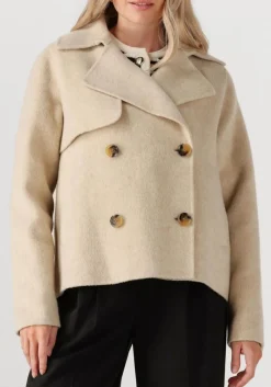 beige janice trenchcoats jean