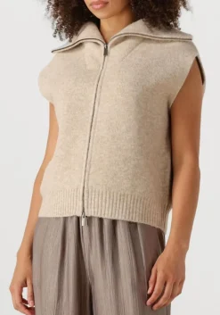 beige knit-ted vest may