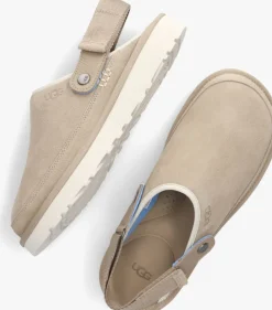 beige ugg slippers marketing model