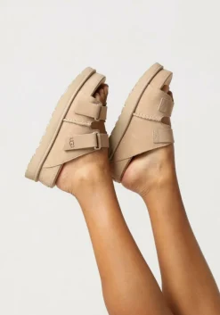 beige ugg slippers w goldenstar hi slide