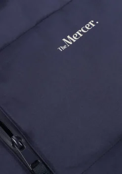 donkerblauwe mercer amsterdam gewatteerde jas the mercer puffer jacket