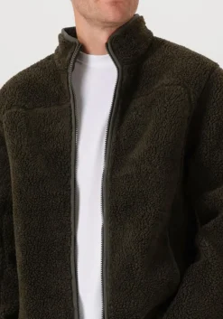 donkergroene peak performance vest m solid pile jacket