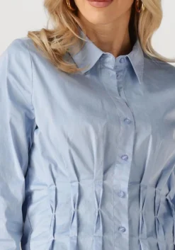 lichtblauwe co'couture blouses poppy pleat waist