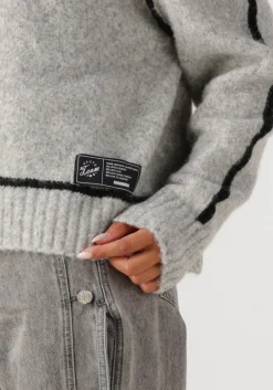 lichtgrijze haute l'amitié trui toby hem line knit