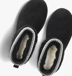 zwarte ugg vachtlaarzen classic ultra mini maxi curly